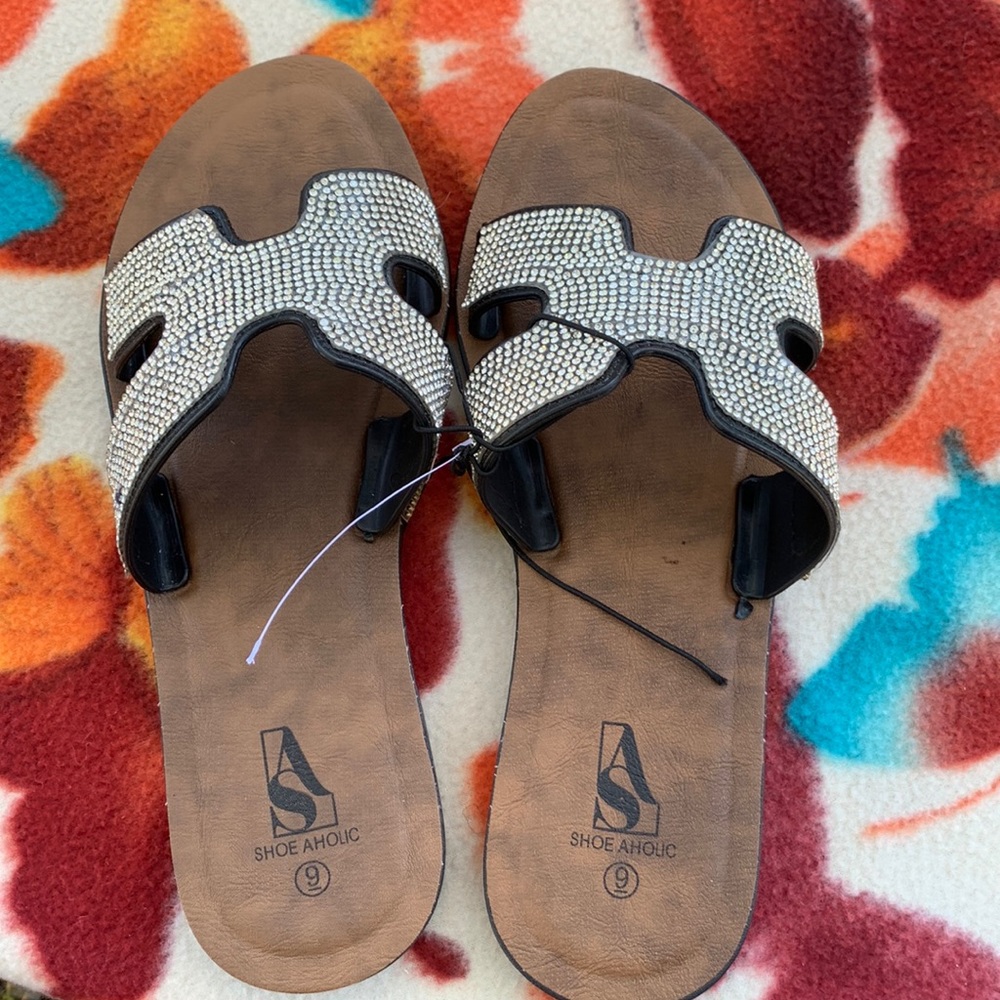 New, never worn sandals